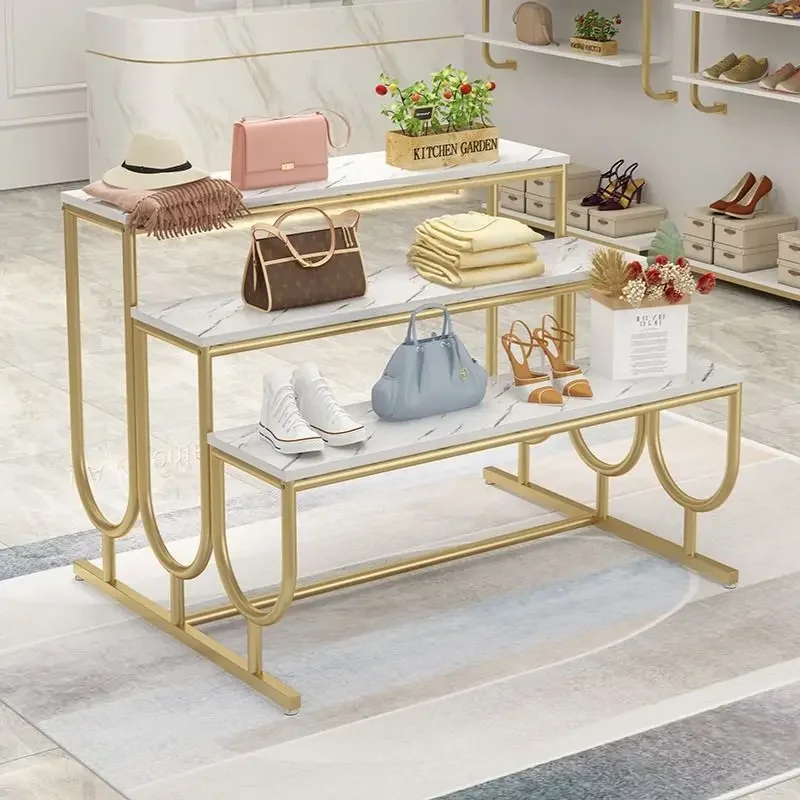 Clothing store island display rack display props in the middle, high and low shoe bag store shoe rack ladder style flow table di