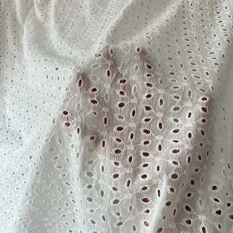 

High Quality 100% Cotton White Hollow Floral Lace Embroidery Fabric DIY Sewing Wedding Dress Dress Fabric Wholesale