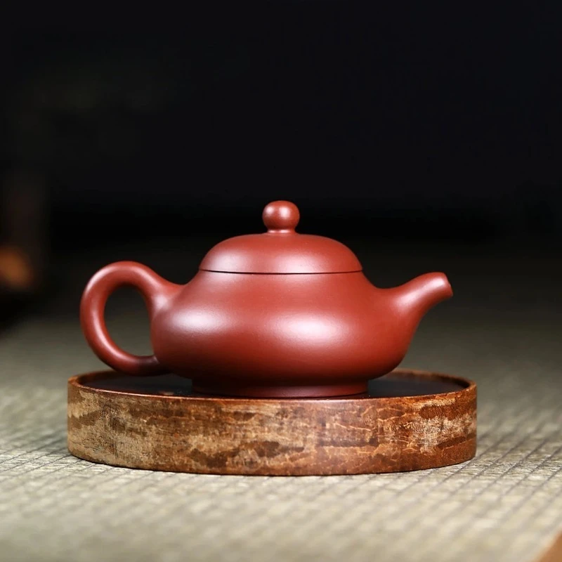 

Steepcode- "Yixing Zisha Teapot 'The Breathing Pot' - 220ml Original Mineral Clay Teapot"