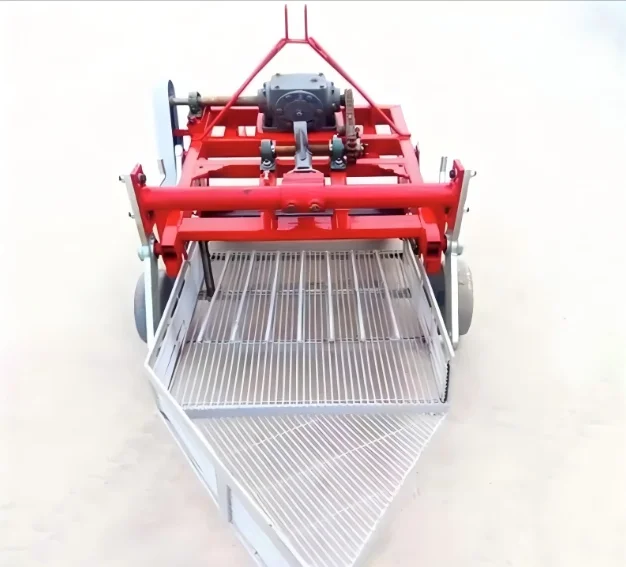 

Ручной комбайн с электроприводом, управляемый ходячим трактором в качестве силы тяги