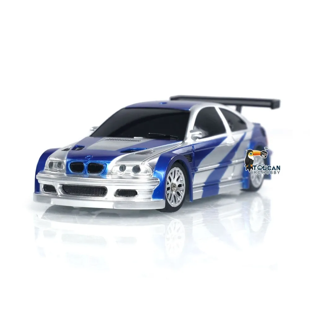 TOUCAN RC Hobby 1/43 Auto Radio Controllata Drift 4WD | 2.4GHz Mini RC Con 8 Coni E Telecomando | Scala 10.5x4x2.3 Cm | Regalo Bambini