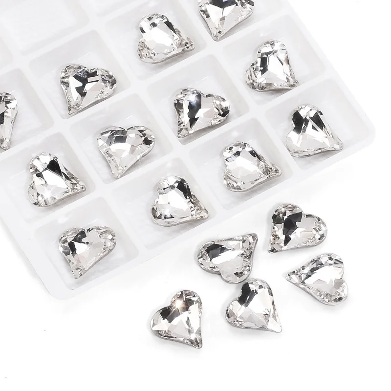 10 pezzi Nail Art cuore storto diamante cristallo unghie da sposa Charms gioielli multicolori luce lusso lucido decorazione accessori