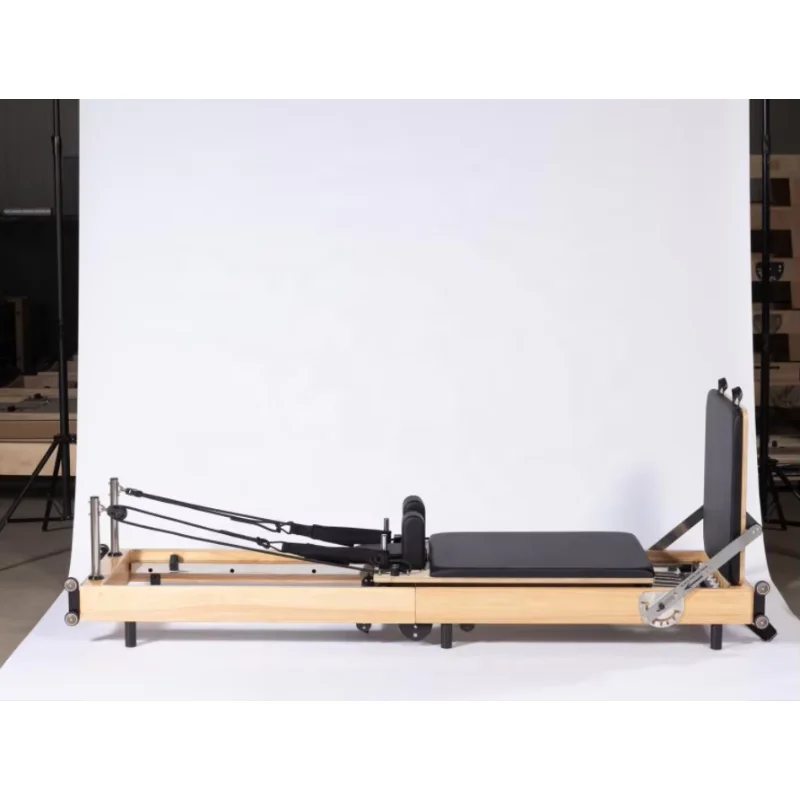 Equipo de Pilates Deren Zhenqu a la venta, cama central de Pilates plegable de madera de arce, estudio o reformador de Pilates plegable para uso doméstico