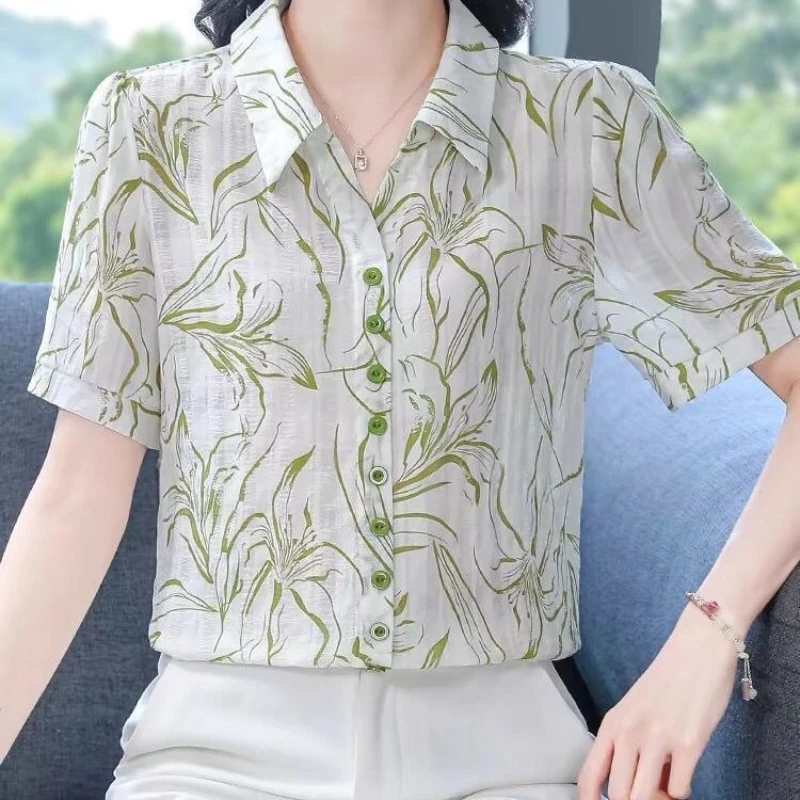 

Новая летняя женская блузка с коротким рукавом, свободного кроя, с принтом, универсальная, модная, визуально стройнящая фигуру.