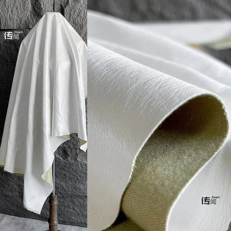 

Белая потрескавшаяся кожаная ткань из искусственной кожи для модной сумки для пальто, дизайнерская одежда, оптовая продажа, ткань для шитья одежды своими руками на метр, материал