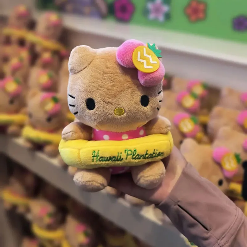 Para Kawaii HelloKitty 50 aniversario hawaiano piel negra piña serie anillo de natación muñeco de peluche mochila decoración colgante