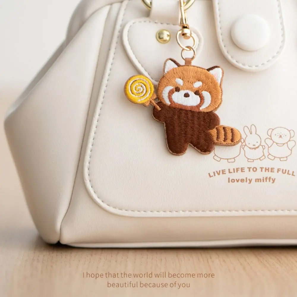 Divertente cartone animato panda rosso portachiavi creativo morbido ciondolo animale kawaii moda cuore panda rosso ricamo ciondolo borsa appesa