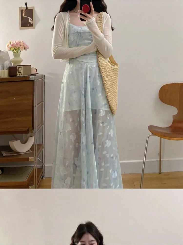 A large-sized spaghetti-strap draping floral print dress and cinched waist chiffon