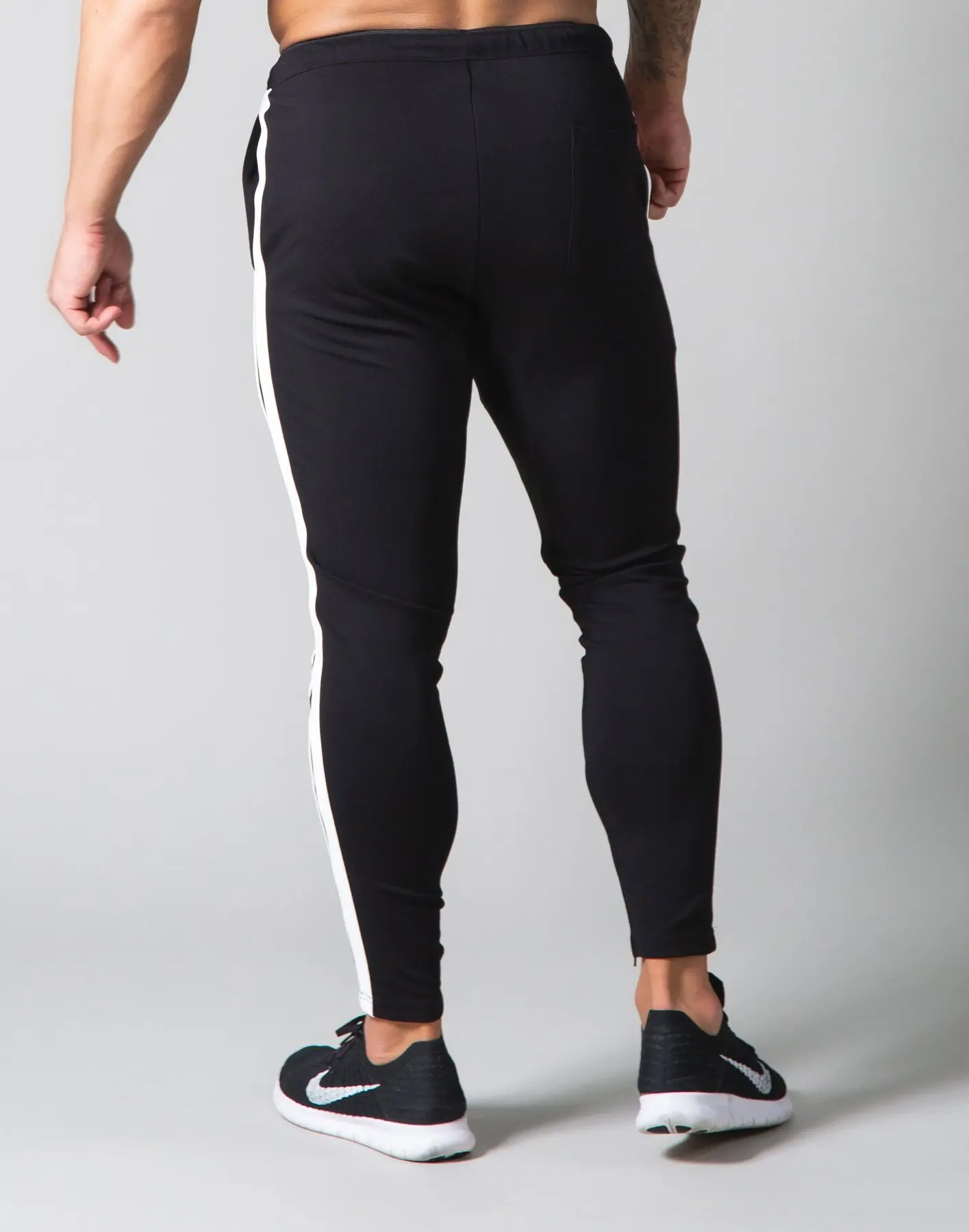 Pantalones de correr para hombre, pantalón de chándal informal con reposapiés, entrenamiento de fitness al aire libre, novedad