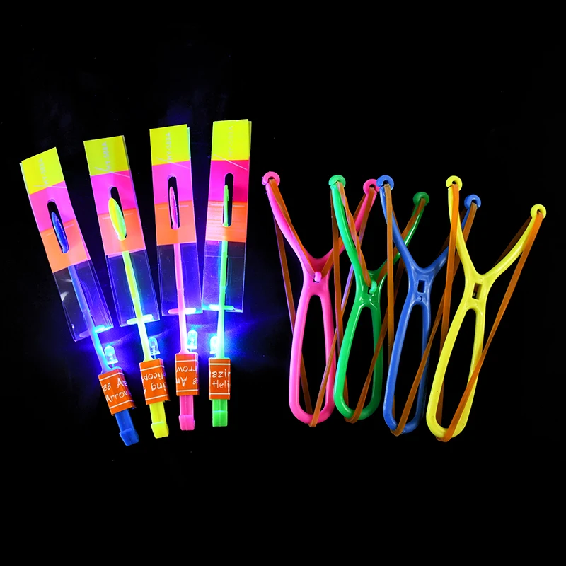 5/10/20pcs HA CONDOTTO LA Luce Freccia Razzo Elicottero Volante Giocattoli Per Bambini Festa Di Compleanno Bomboniere Sacchetto Regalo Pinata Riempitivi Elastico Catapulta