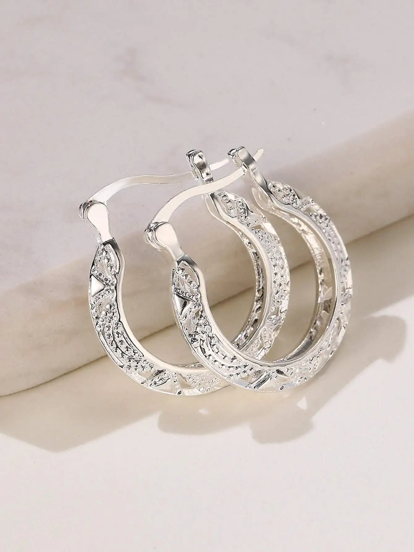 

Textured Silver Hoop Earrings with Intricate Filigree Design for Everyday Wear
