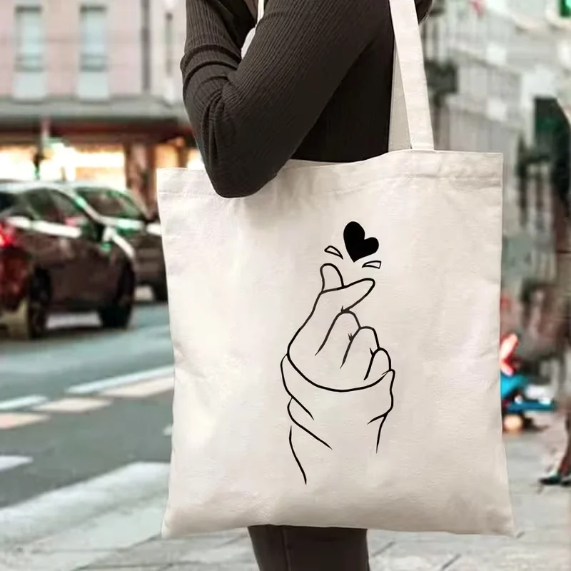 

2026 new White Canvas Tote Bag Minimalist Finger Heart Print Reusable Shoulder Bag Casual Eco-friendly Tote for K-pop Lovers