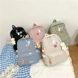 Bear and badge are presented, and the new summer fashion student large-capacity school bag is fresh, trendy, and Harajuku should