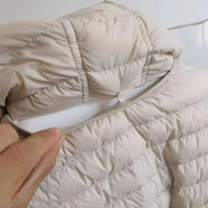 가볍고 흰색의 Du down Puffer Jaet 여성용 루즈핏 중간 길이 허리 조이는 벨트가 있는 후드 다용도 봄 시즌