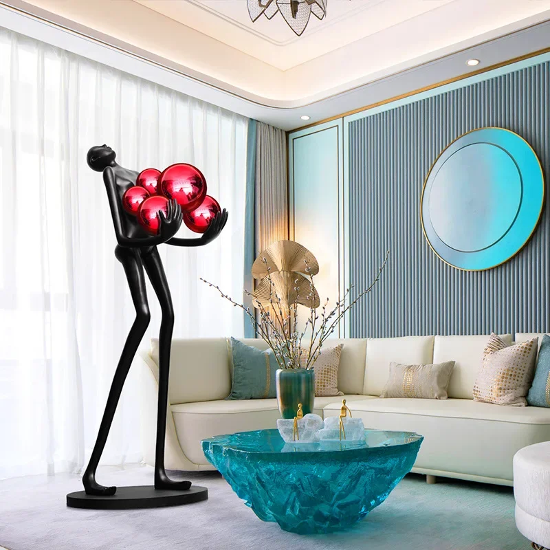 Nordic creative design figure sculpture floor lamp LED arm hug ball hotel exhibition office sales vertical style