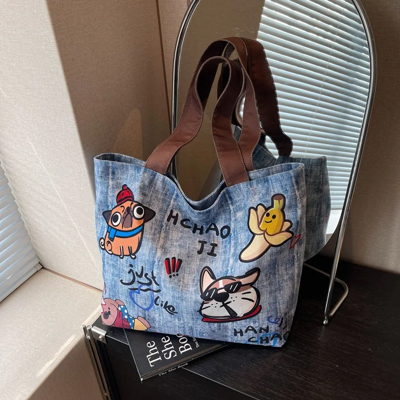 

Korean Version of Casual Painted Cartoon Cloth Pocket Tote Bag 2025 New Cute Girl Versatile Texture Shoulder Bag