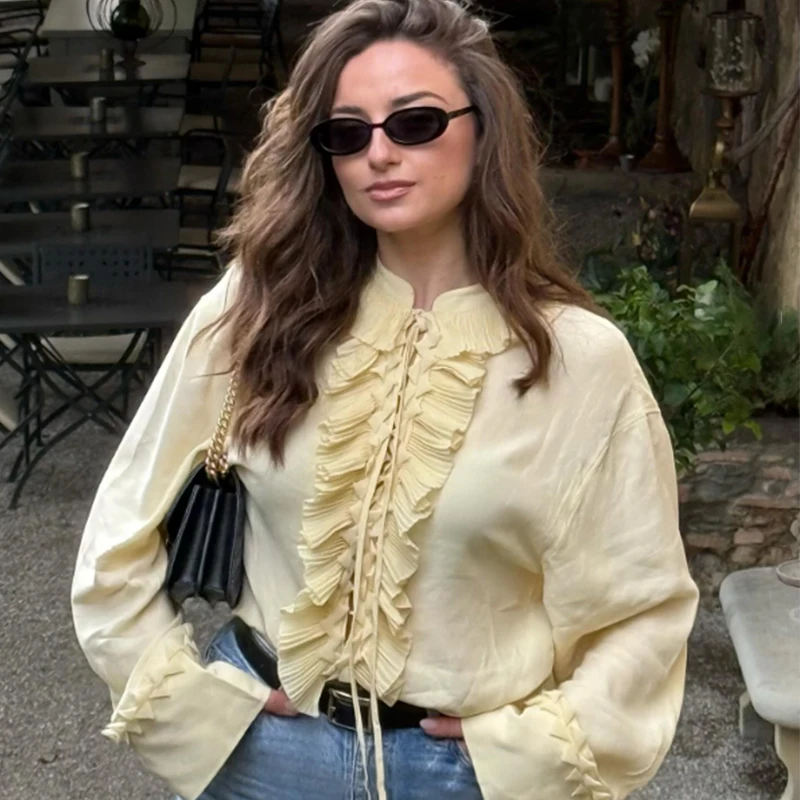 เสื้อผู้หญิง HXAO แบบระบายสีเหลือง เสื้อแขนยาวผูกเชือก ผ้าลูกไม้ เสื้อแฟชั่นฤดูใบไม้ร่วง ไซส์ใหญ่ ดีไซน์หรูหรา