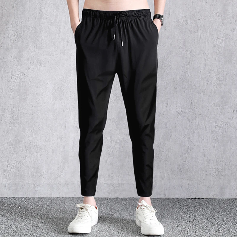 

Summer Men's Harem Pants New Solid Color Trend Versatile Elastic Outdoor Fitness Jogging Pants Men's Thin Style Pencil Pants