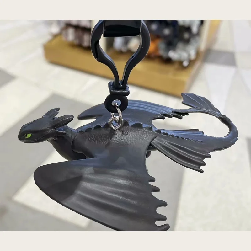 

Universal Studios Toothless Night Fury Figurine Keychain, Car Ornament & Backpack Charm, Travel Souvenir Gift