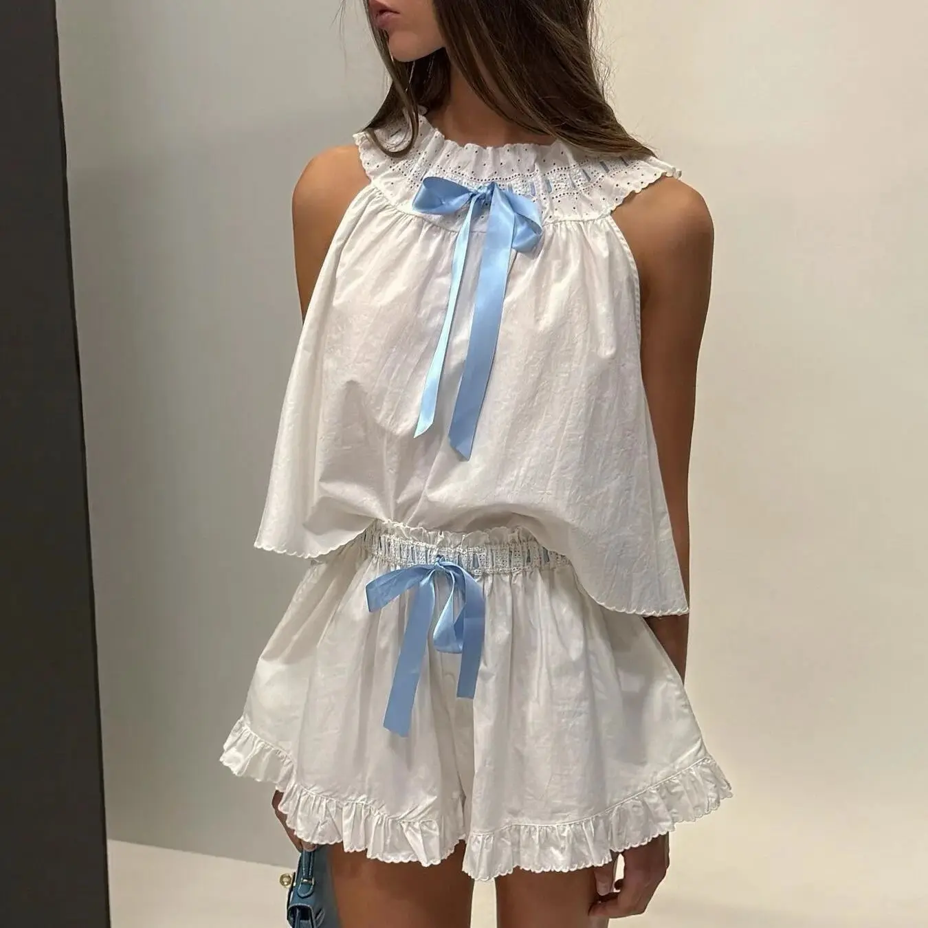 

Women Embroidery white casual cotton set Drawstring sleeveless shirt top + lace-up ruffle shorts