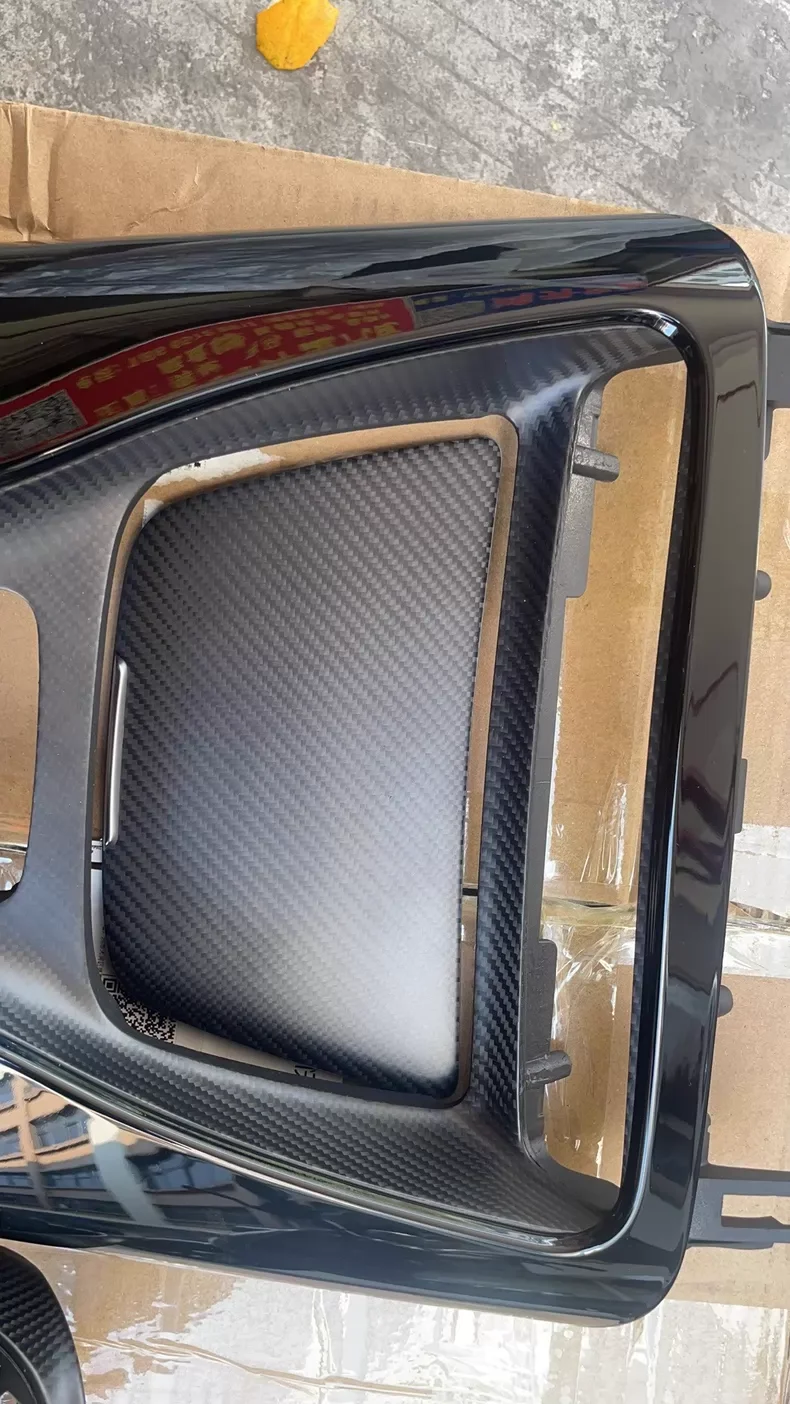 Carbon fiber interior trim and center console for the new Mercedes-Benz W190 AMG GT.