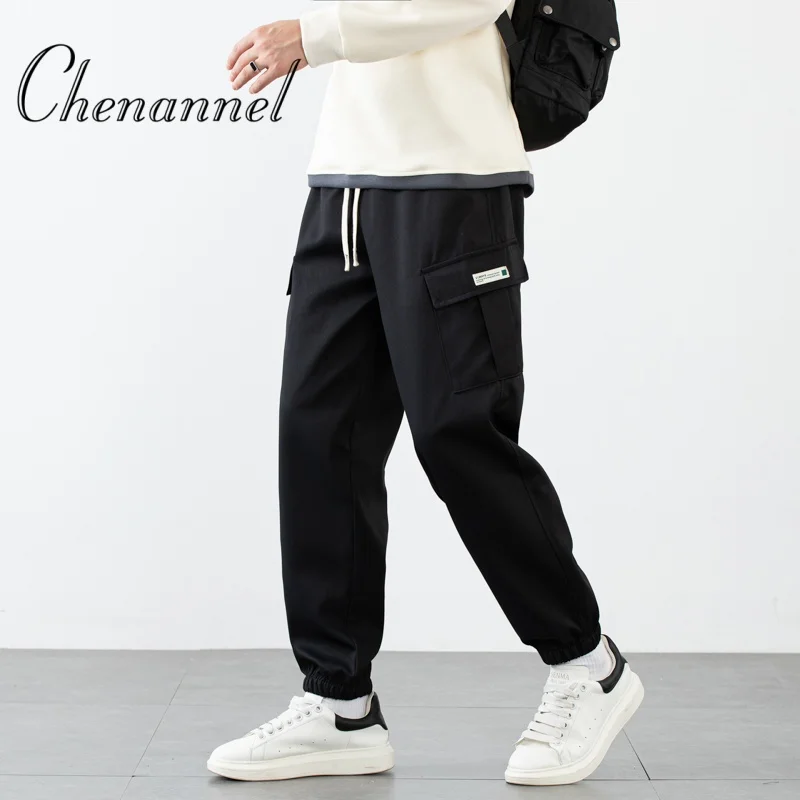 กางเกงจ็อกเกอร์ทรงหลวมหลายกระเป๋า สไตล์สตรีทสำหรับผู้ชาย กางเกงลำลองผูกเชือกเอว กางเกงคาร์โก้ สำหรับออกกำลังกายและกิจกรรมกลางแจ้ง