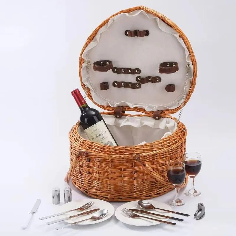 Braided heart picnic basket with handle, a braided basket for storing cutlery, including knives and forks.