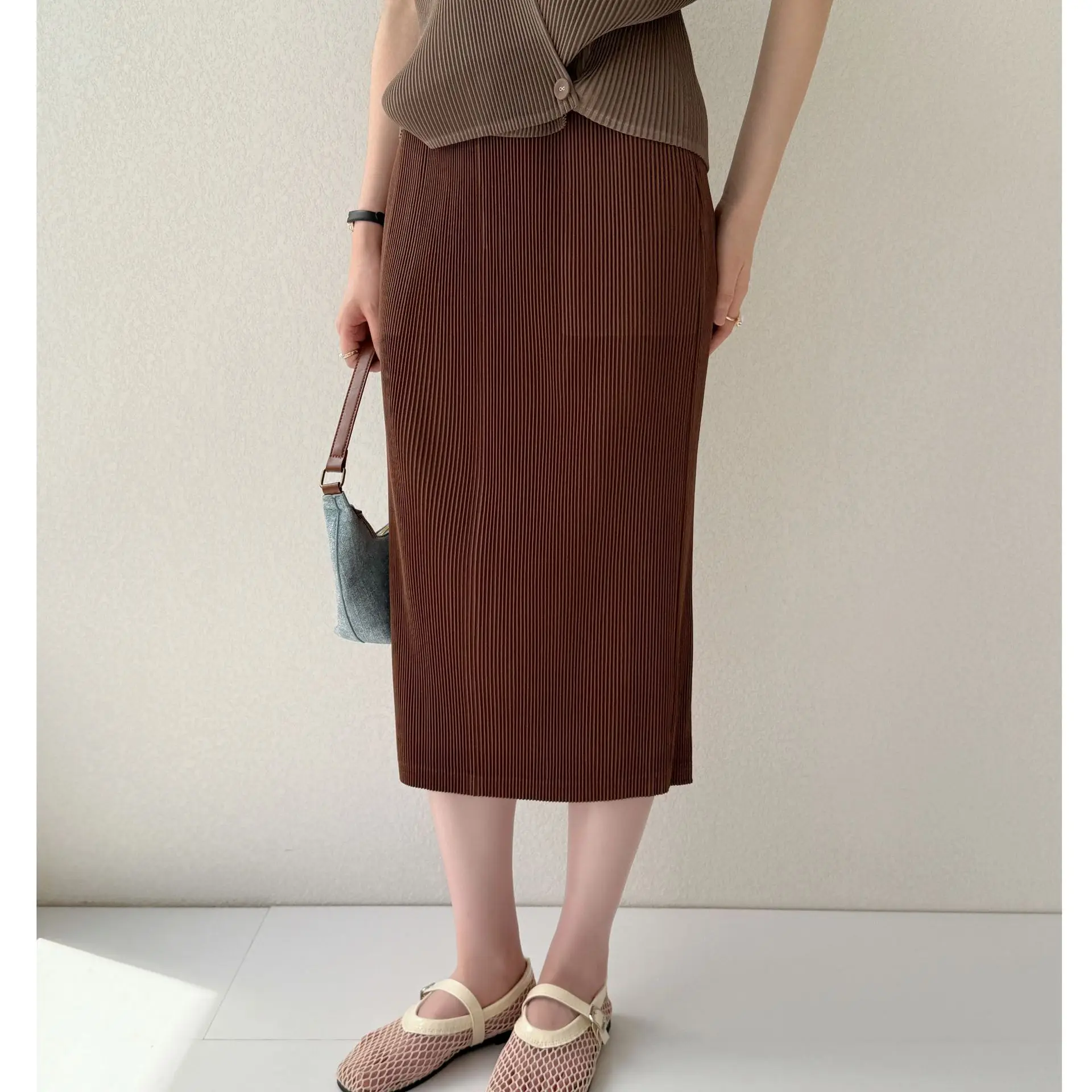 Miyake Pieghettato Nuovo 2025 Autunno e Primavera Moda High-end Abiti A Pieghe Temperamento Pendolarismo Pacchetto Hip Gonna a Mezzo Corpo