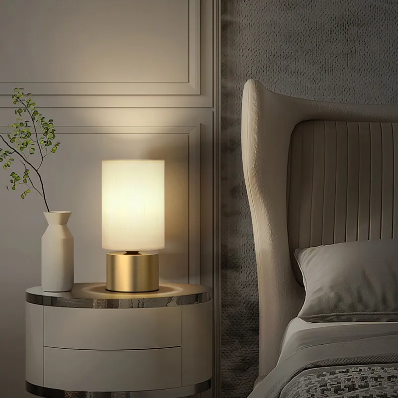 All-brass modern Nordic fabric lampshade table lamp E14 bulb base, simple and flexible design, warm atmosphere light