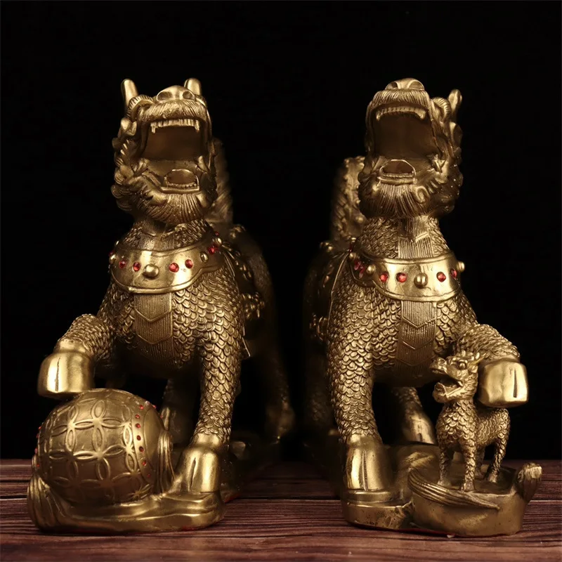 A pair of brass ornaments: stepping on a ball, mother and son , Kirin playing with pearls, suitable for office