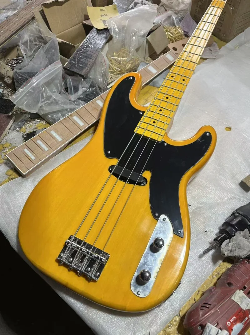 High quality 4-string electric bass,Transparent yellow body and neck,Black pickpocket,Solid wood quality,Free delivery