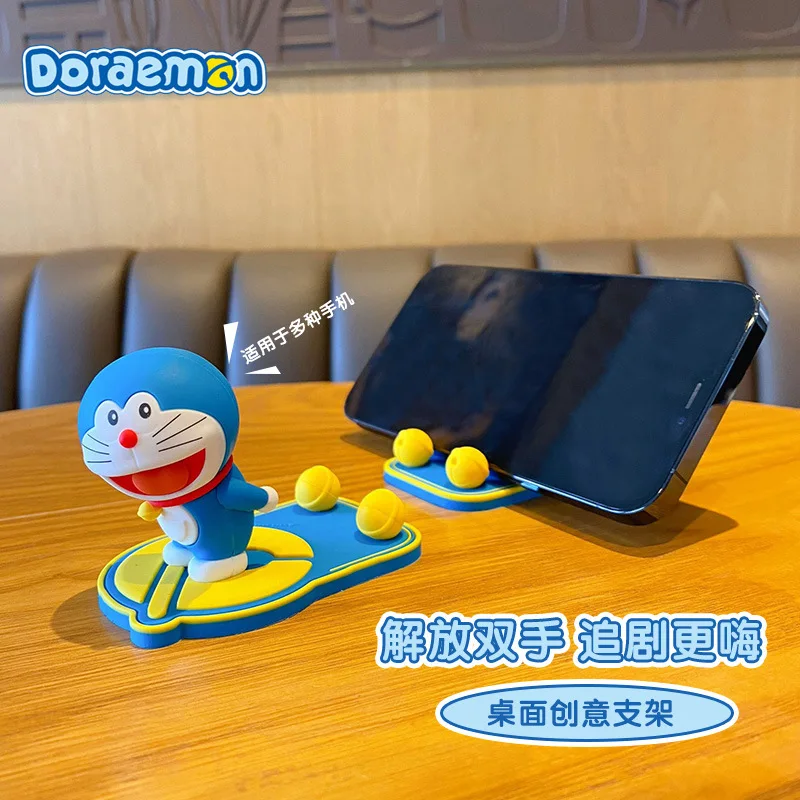 Kawaii Doraemon Mobile Phone Holders Cartoon Animation Doraemon Kicks Desktop Ornaments Decoration Gifts Mobile Phone Holders