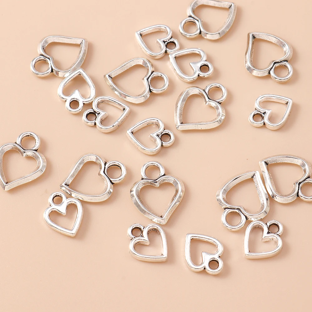 Leslie 30 Stück hohle, niedliche Liebesherz-Anhänger für DIY-Armbänder, Halsketten, Anhänger, handgefertigtes Schmuckzubehör – Detail 1