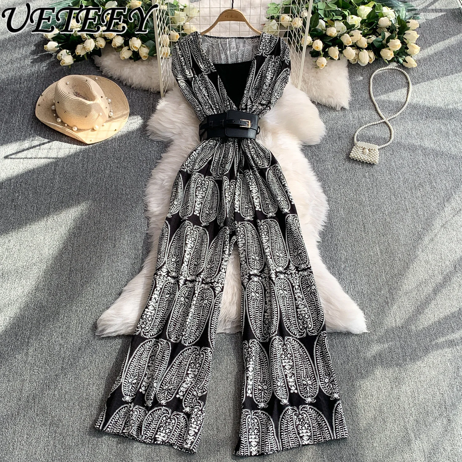 อารมณ์พิมพ์คอวีแขนสั้นJumpsuitผู้หญิงฤดูร้อนความรู้สึกอาวุโสกับเข็มขัดเอวสูงกางเกงขากว้างBodysuit