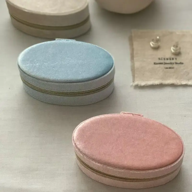 

Легкая роскошная шкатулка для хранения ювелирных украшений, овальная портативная коробка на молнии для колец, серег и других украшений.