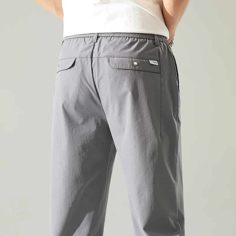 

Корейские тонкие повседневные брюки для мужчин, дышащие, модные, эластичные, длиной до щиколотки, из ледяного шелка, быстросохнущие, весенне-летние брюки