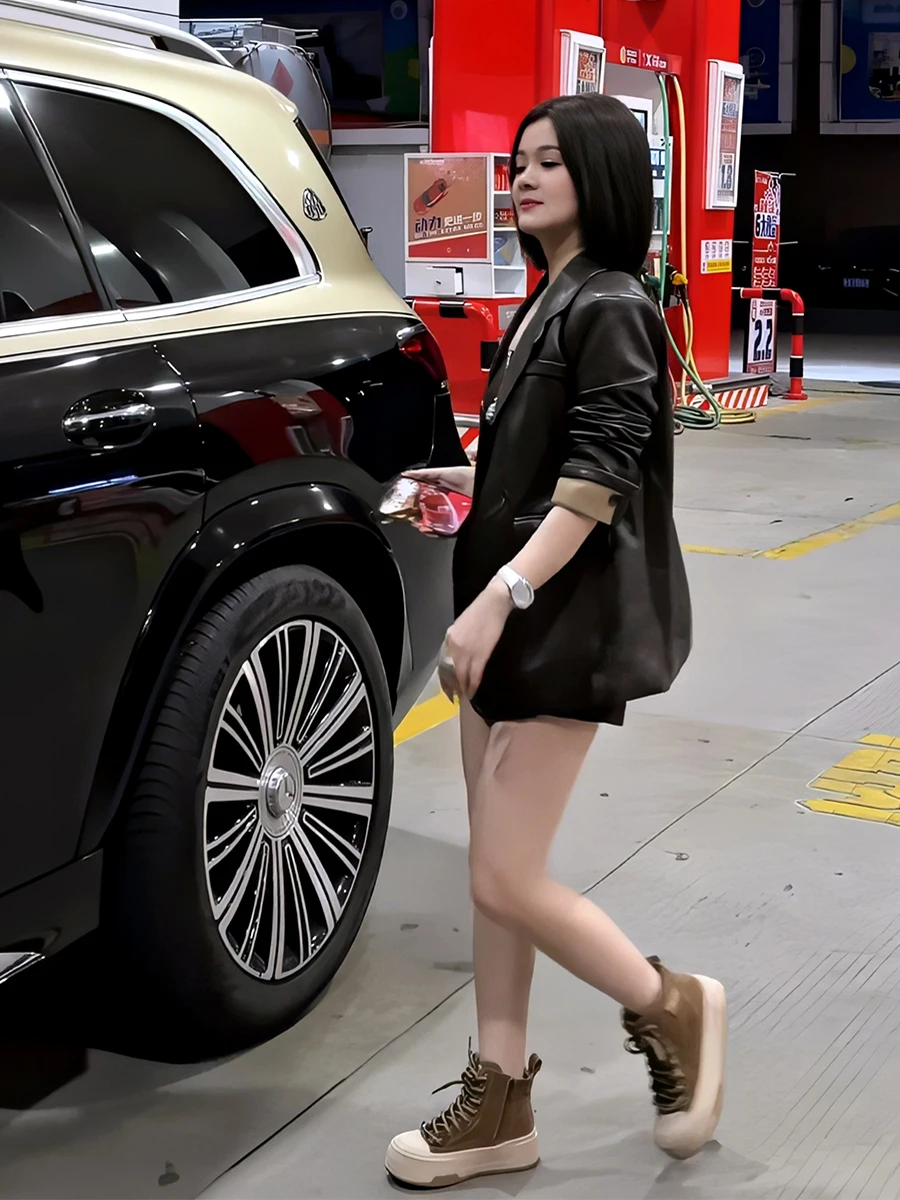 เสื้อโค้ทหนัง PU แบบหลวม สไตล์ลำลอง สำหรับผู้หญิง ให้ความอบอุ่น เหมาะสำหรับฤดูใบไม้ร่วง ดีไซน์ใหม่ทันสมัย แขนยาว ติดกระดุมสองเม็ด