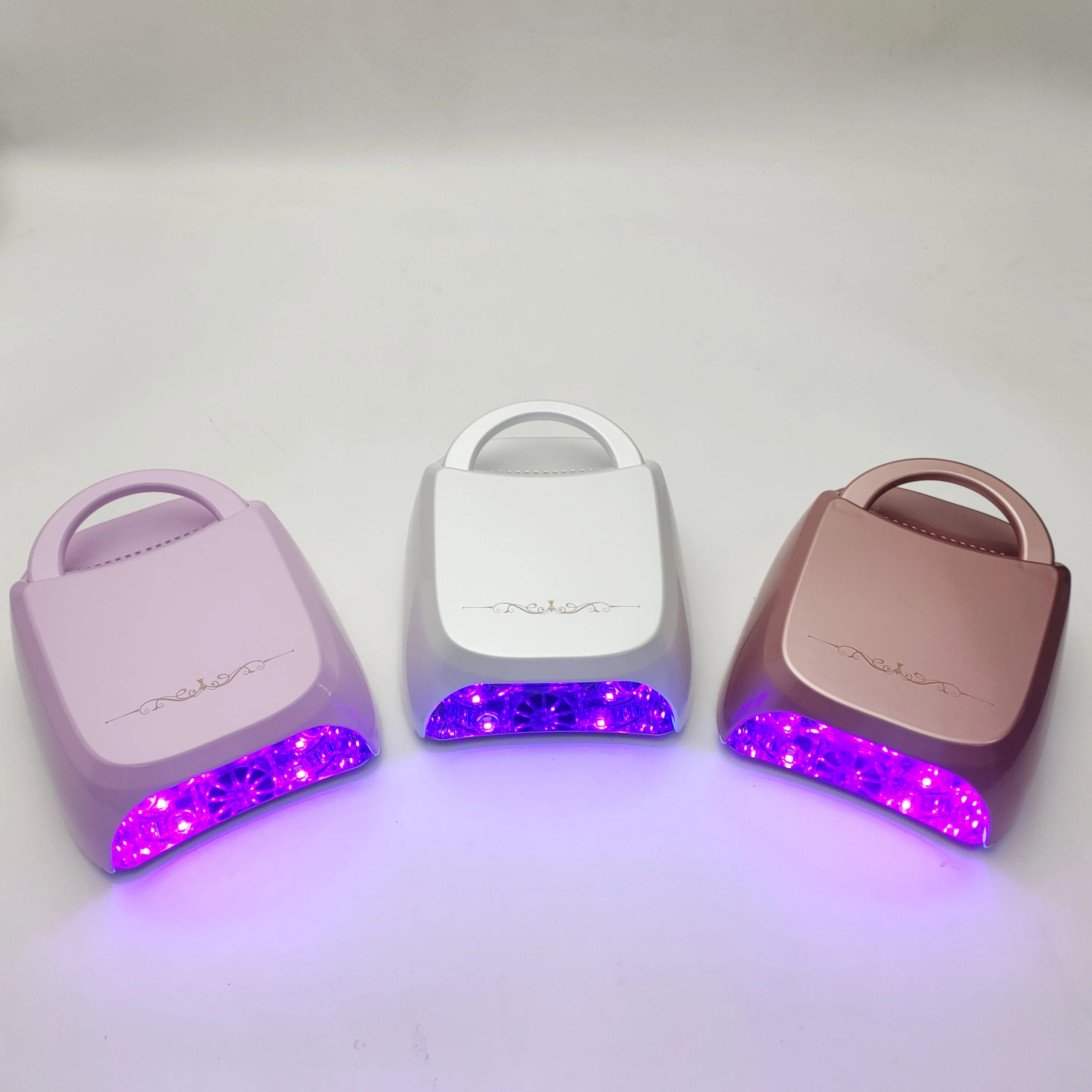 

Popular Luxury Metal Gel Nail Lamp Label Logo Cordless Rechargeable Professional Lash UV Led Nail Lamp