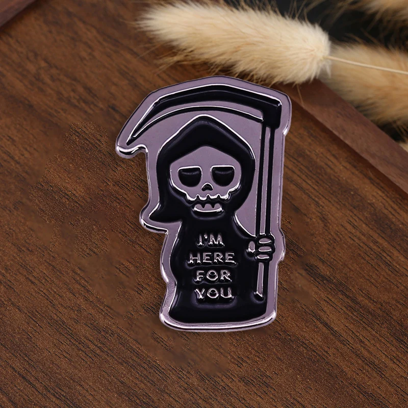 Death God, I'm right by your side. Cute cartoon Death God holding a scythe badge. Novel backpack decoration