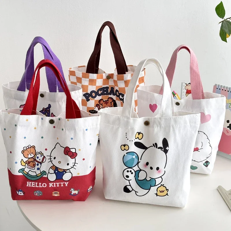 Sanrio-Bolso de mano de Hello Kitty para mujer, bolsa de hombro de lona de dibujos animados con broche, regalo para niñas, bolso de marca de lujo,