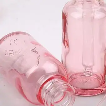 زجاجات قطارة قابلة لإعادة الملء 5-100 مللي غطاء وردي حاوية مستحضرات تجميل زجاج وردي ماصة سائلة للعلاج بالروائح للتدليك الأساسي