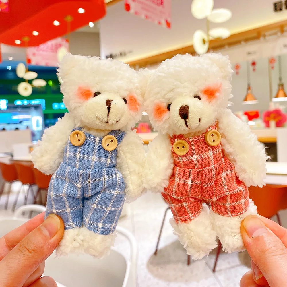 قلادة قطيفة، حقيبة كتف، نظارات شمسية، حقيبة ملابس كرتونية على شكل دب، سلسلة مفاتيح، دمية، إكسسوار هدايا للطلاب