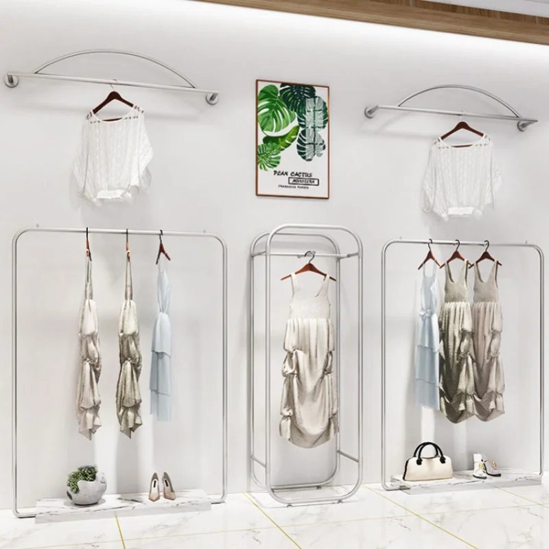 custom，Retail Clothing Store Interior Design Gold Garment Shelf Wall Mounted Clothing Display Racks