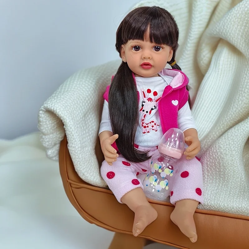 Muñeca Reborn Girl de 22 pulgadas, material de vinilo, pelo largo y liso negro, conjunto de ropa rosa, ojos exquisitos, poseible, caja de regalo