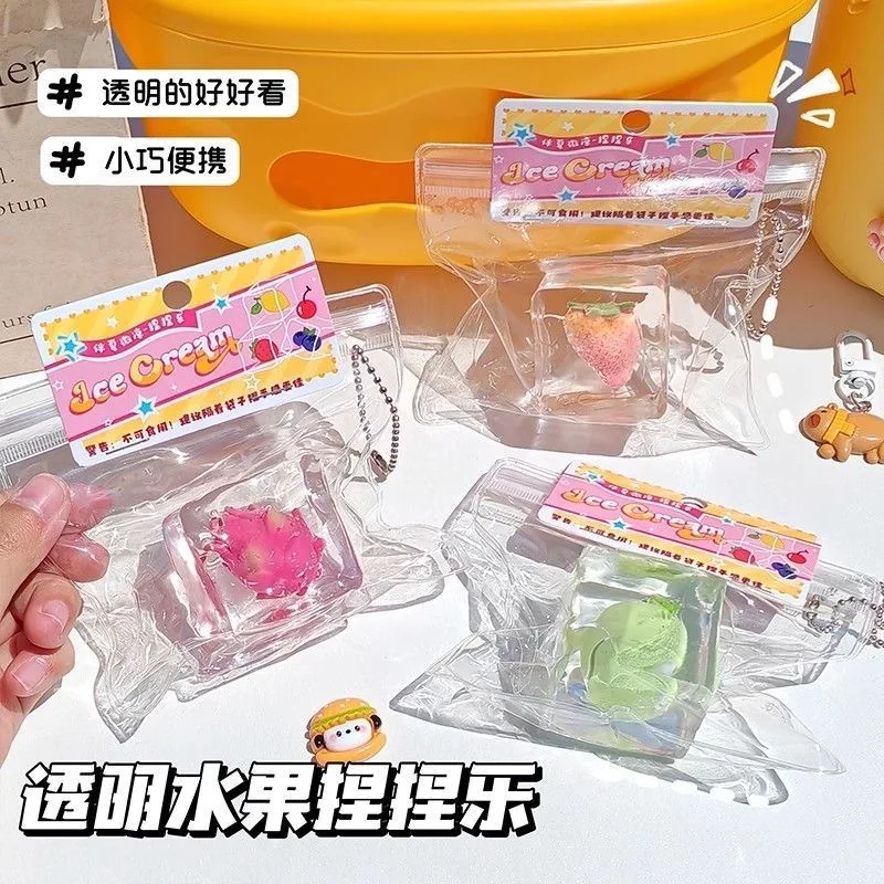 アイスキューブ＆フルーツスクイーズキッズドールキーホルダー - 鼻くそ型ストレス解消おもちゃ、ゆっくり戻る必須アイテム