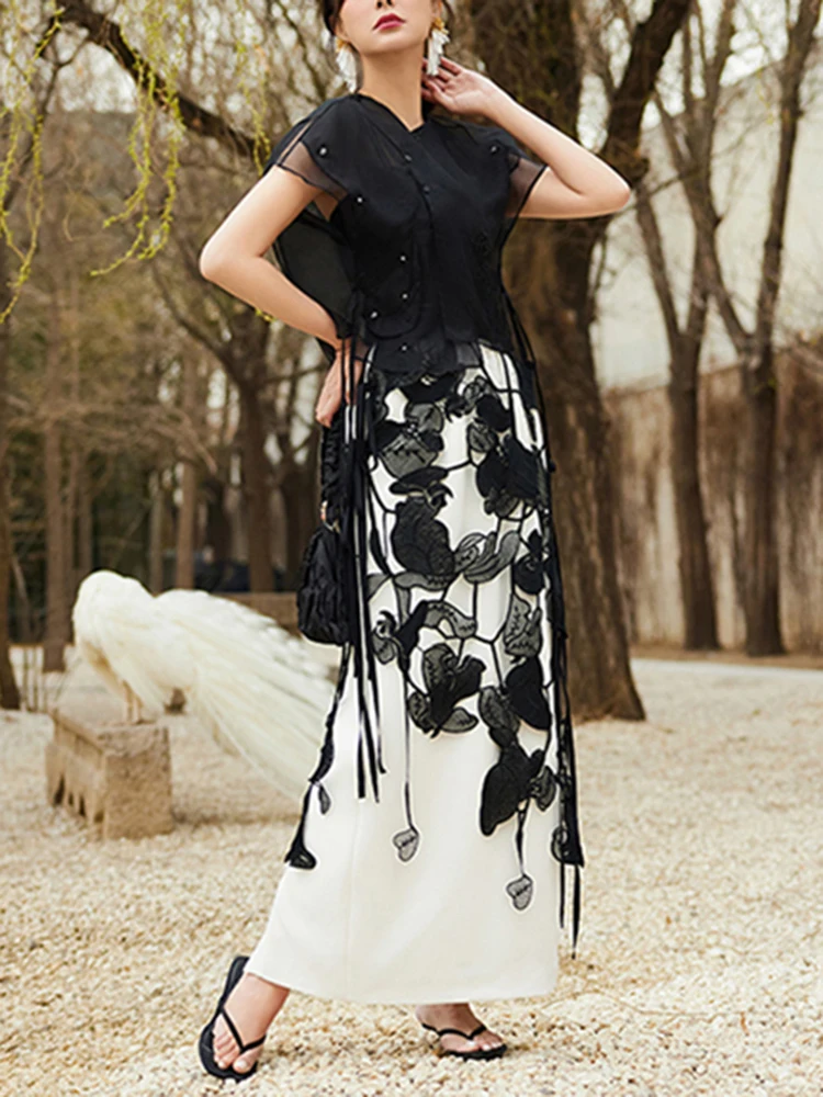 TWOTWINSTYLE Solid Hollow Out Minimalist Loose Skirts For Women High Waist Temperament Embroidery Skirt Female Fashion Style New