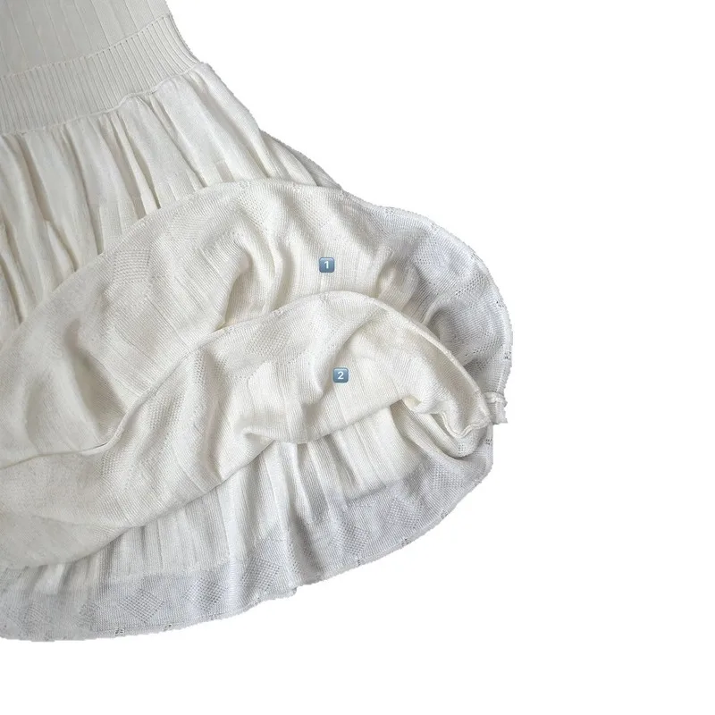 Mini abito estivo in maglia stile bambola con scollo rotondo e maniche corte