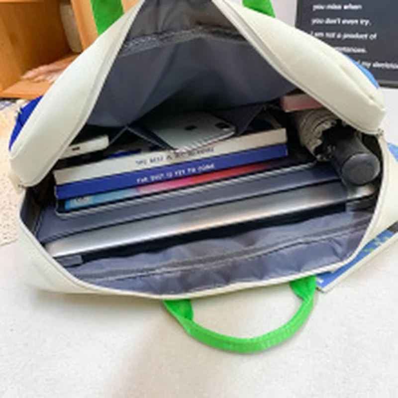 Borsa a tracolla con volto sorridente simpatico cartone animato per studenti Borse per laptop ricamate all-match Borse versatili di grande capacità alla moda