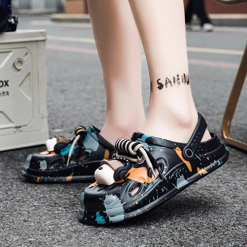 زوج من شباشب رجالية EVA ذاتية الصنع مزينة بسماعات أذن لطيفة ومثيرة للاهتمام، مناسبة للاستخدام الداخلي والخارجي على حد سواء