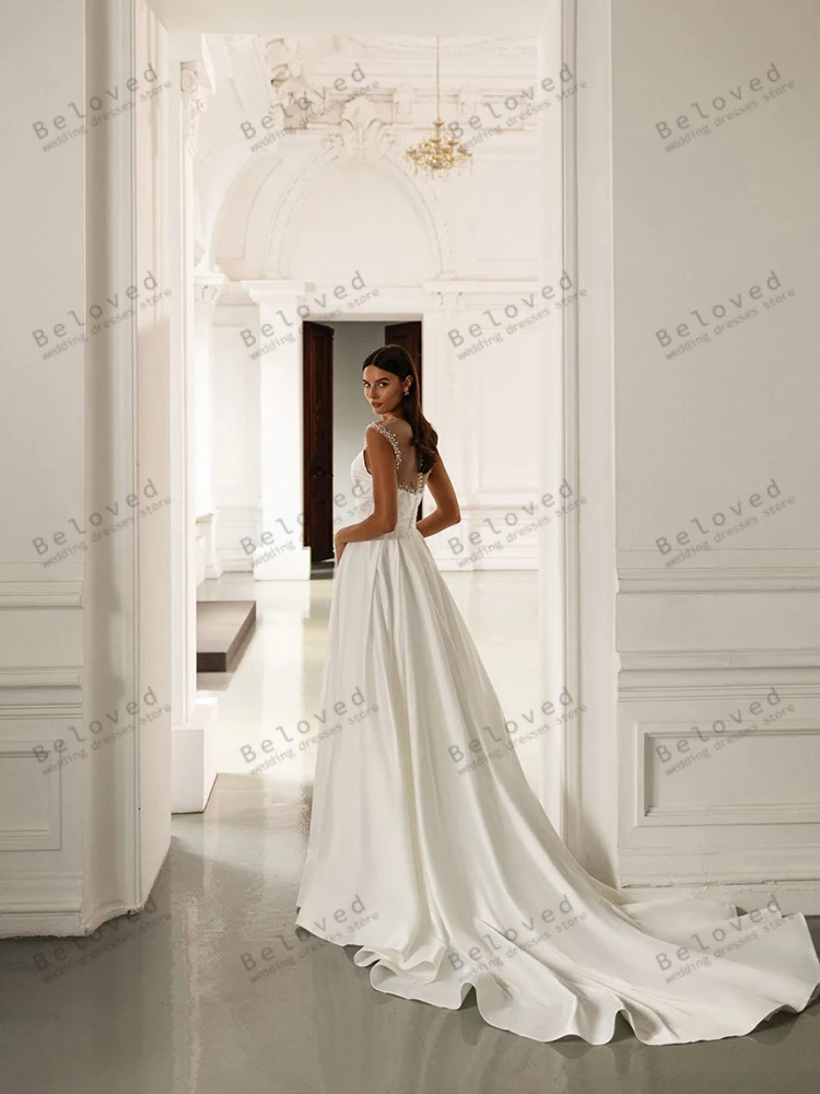 우아한 웨딩 드레스 라인 새틴 신부 가운 레이스 아플리케 민소매 바닥 길이 간단한 베스 티드 드 노비아 맞춤 제작